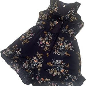 Navy blue romper with floral design. Size medium